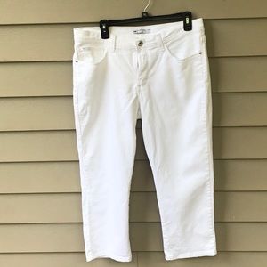 White crops by Lee. Sit just below the waist.